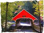 How can you resist the brilliant red color of a covered bridge? 